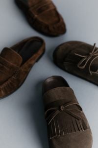 Kaboompics - Close-Up of Brown Suede and Fringe Shoe Details