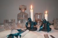 Kaboompics - Candlelit Table with Crystal Glassware and Teal Bows