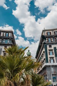 Kaboompics - Umberto I Statue Between Historic Naples Buildings and Palm Trees
