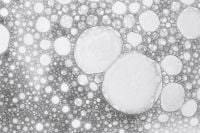 Kaboompics - Large White Bubbles among Dense Gray Foam, High-Detail Macro Background