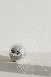 Kaboompics - New Year's Eve Background with a Mirror Ball and Reflected Light