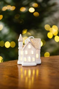 Kaboompics - White House Ornament on a Wooden Table
