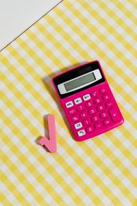 Kaboompics - Vertical Pink Calculator and Square Root Symbol With Copy Space