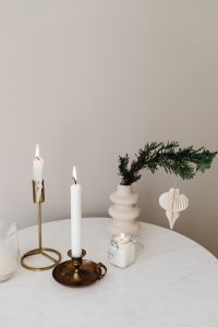 Kaboompics - Neutral Candles With Evergreen Branch and Paper Ornament