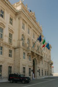 Kaboompics - Neoclassical Trieste Facade with Tall Windows and Stone Balustrade