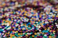 Kaboompics - Purple, Blue and Teal Sequin Bokeh on Dark Fabric, Vertical Abstract Background