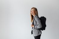 Kaboompics - Teenage Student with Black Backpack in Grey Blazer