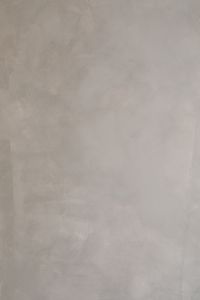 Kaboompics - Gray Plaster Wall with Patchy Texture