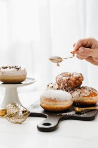 Kaboompics - Homemade Raspberry Polish Paczki Donut with Powdered Sugar
