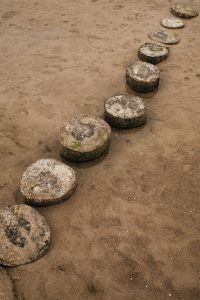 Kaboompics - Round Stones Arranged on Wet Sand