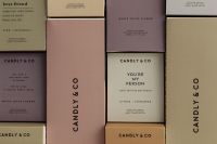 Kaboompics - Fragrance Packaging Boxes in a Soft Neutral Grid