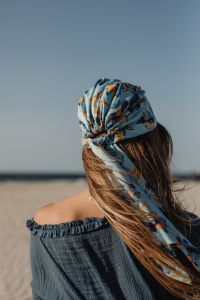 Kaboompics - Blonde Woman in Floral Headscarf and Blue Off Shoulder Dress