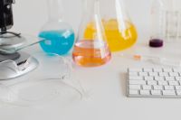 Kaboompics - Colorful Chemistry Flasks and Computer Keyboard