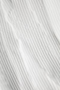 Kaboompics - Fine Diagonal Ridges in White Cream, Skincare Texture for Beauty Backgrounds