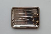 Kaboompics - Overhead Dental Tool Kit Arranged in Metal Tray