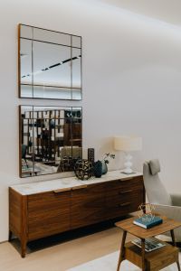 Kaboompics - Marble-Topped Wooden Commode with Wall Mirrors and Home Decor