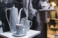 Kaboompics - Striped Ceramic Pitcher and Cups in Design Store Display