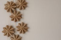 Kaboompics - Close Up of Hanging Wooden Snowflake Garland