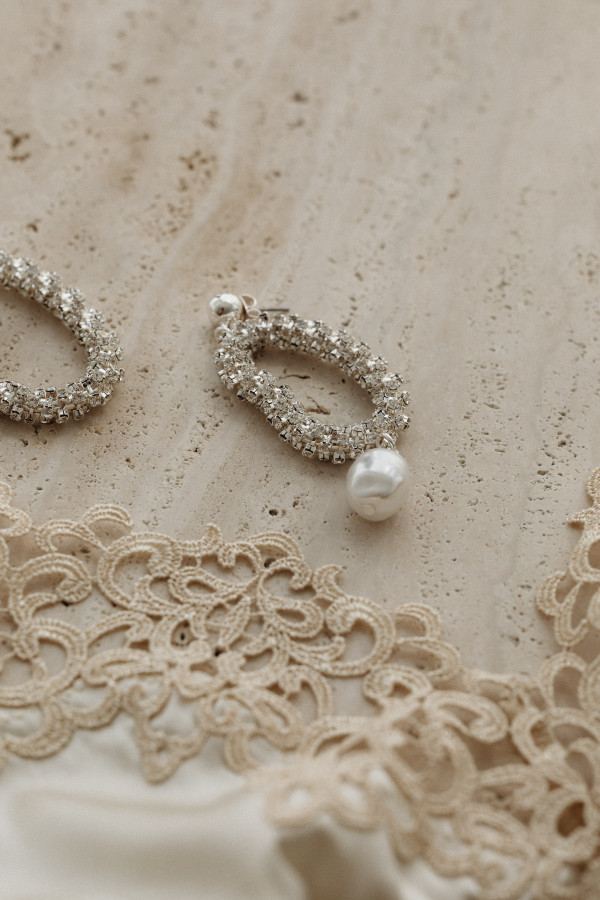 Satin light beige bra trimmed with lace - silver earrings with zircons ...
