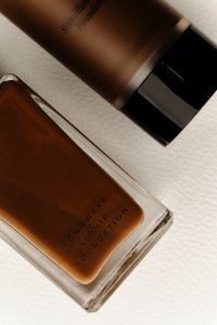 Kaboompics - Two Liquid Foundation Bottles on White
