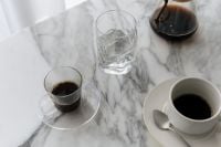 Kaboompics - Coffee Cups and Water Glasses on Marble Table