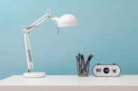 Kaboompics - Wire Pencil Cup Beside a White Flip Desk Clock