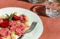 Kaboompics - Pink Fusilli With Strawberries and Mint on Summer Table