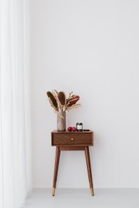 Soy Candle and Plum Still Life for Home Fragrance Branding and Neutral Decor