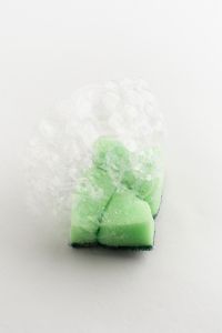 Kaboompics - Green Sponge With Soap Bubbles