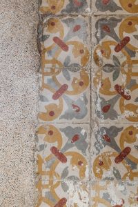Kaboompics - Close-Up Colorful Vintage Tile Pattern beside Speckled Terrazzo