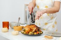 Kaboompics - Wide Thanksgiving Table with Turkey Carving in Progress