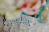 Kaboompics - Soft-Focus Blue Sofa Cushions Framed by White and Pink Flowers