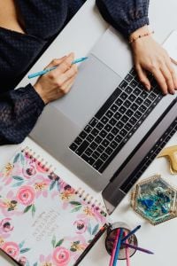 Kaboompics - Happy casual beautiful woman working on a laptop