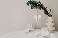 Kaboompics - Paper Christmas Ornament Above Evergreen Branch