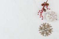 Kaboompics - Pinecone and Red Berry Christmas Sprig with Silver Ornaments