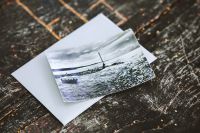 Kaboompics - Vintage Landscape Postcard on Dark Marble Surface