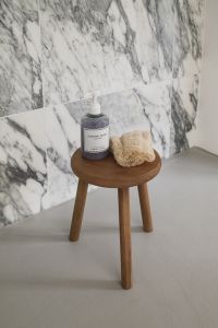Kaboompics - Wooden Stool with Soap and Loofah on Arabescato Wall