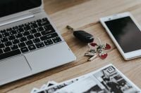 Kaboompics - Black-and-white photos with a silver laptop, a smartphone and car keys