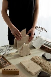 Kaboompics - Stone Sample Styling with Dried Botanical in a Neutral Workspace