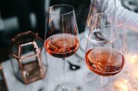 Kaboompics - Single Rose Wine Glass with Christmas Table Decor and Copy Space
