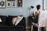 Kaboompics - Woman Working From Home With Cat On Sofa