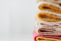 Kaboompics - Folded Yellow Fringed Blanket