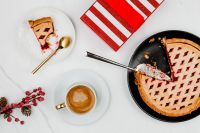 Kaboompics - Blueberry Pie and Cappuccino with Red Striped Gift Box and Winter Berries