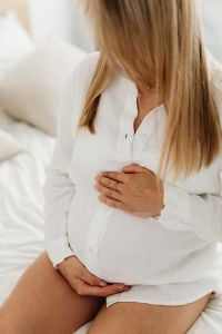 Kaboompics - Close-Up Pregnant Woman Holding Her Belly