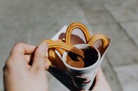Kaboompics - Churros with a cup of hot chocolate