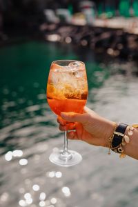 Kaboompics - Aperol Spritz with Dark Green Water Bokeh