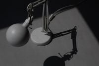Kaboompics - Abstract Shadow Background with White Sphere and Wire Form