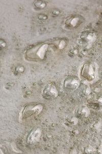 Kaboompics - Scattered Water Droplets on Glass with Open Neutral Background