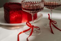 Kaboompics - Red Cocktails in Crystal Glasses with Satin Ribbon Bows