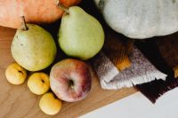 Kaboompics - Horizontal Autumn Still Life of Green Pears, Gray Pumpkin and Plaid Blanket